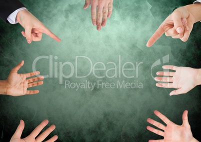 Hands in circle over green background
