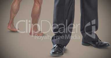 Businessman feet and shoes with naked and dressed with brown background
