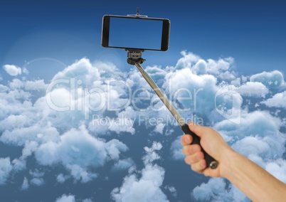 Selfie stick in the sky diving clouds