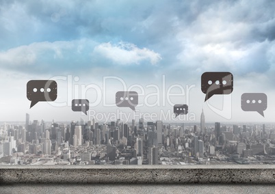 Chat bubble icons over city