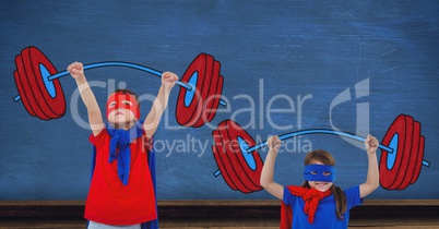Superhero kids lifting cartoon weights with blue wall