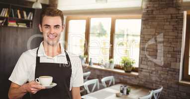 Happy small business owner man holding a coffee