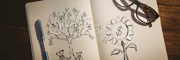 Tree and fower drawings with money in notepad