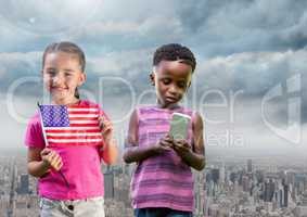 kids holding american flag and phone with city background