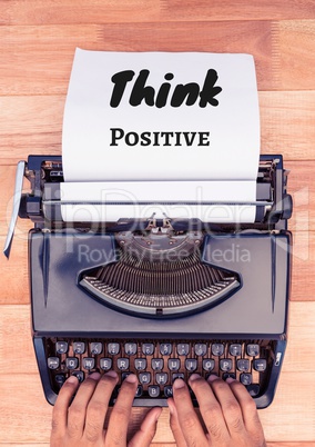 Think positive  text written on page with typewriter