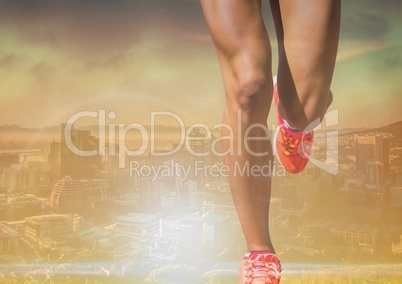 Athletic legs running in bright landscape