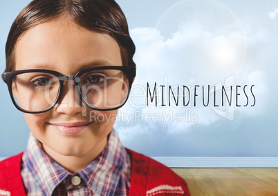 Boy with glasses in cloudy room and mindfulness text