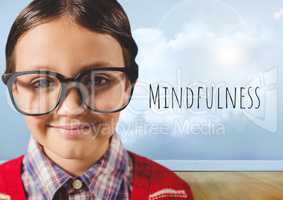 Boy with glasses in cloudy room and mindfulness text
