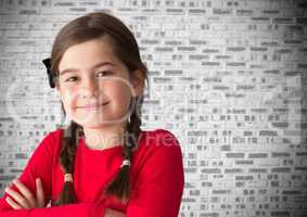 Girl in front of brick wall