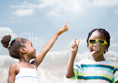 Kids pointing at sky and playing