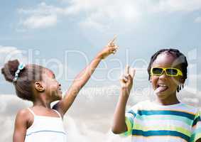 Kids pointing at sky and playing