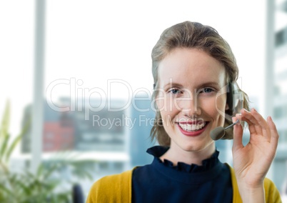 Happy customer care representative woman against office background