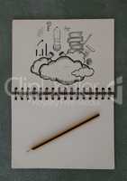 Drawings of clouds and books in notepad