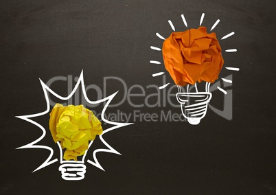 light bulbs on blackboard with chalk and crumpled paper balls