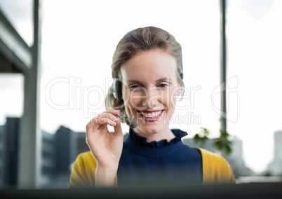 Happy customer care representative woman against city background