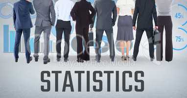 Group of business people standing in front of statistics performance charts