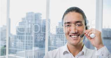 Happy customer care representative man against city background