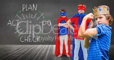 Superhero kids and king crown boy with blackboard background and plan graphics