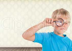 Boy holding magnifying glass with room background