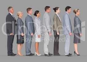 Full body portrait of business people standing in line with grey background