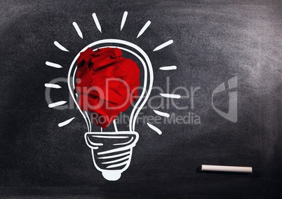 light bulb with crumpled paper ball in front of blackboard