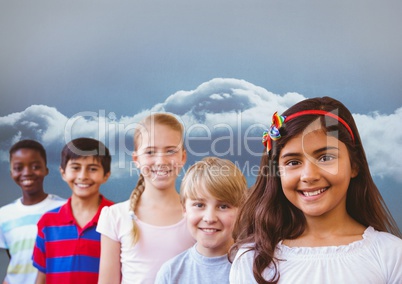 Group of kids with cloudy sky