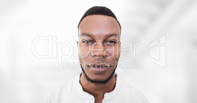 Business man standing against white blurred background