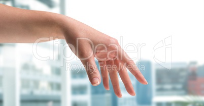 Expressive Hand posing with city background blur
