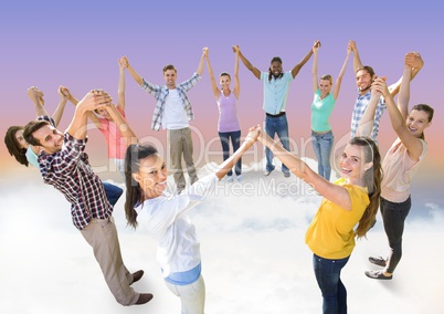 Circle of people holding hands together in clouds