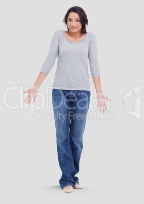 Full body portrait of woman standing with grey background