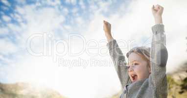 Girl celebrating under the sky