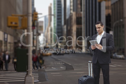 Business man holding a tablet against city background