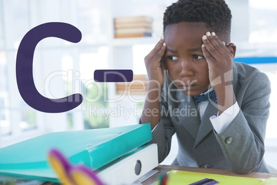 C- text against worried office kid boy background