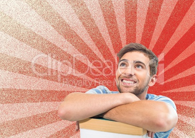 Happy young student man looking up against red and white background