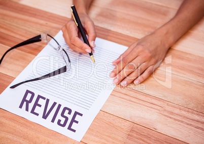 Revise  text written on page with wooden table