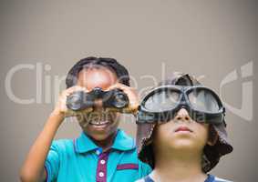 kids holding binoculars with blank brown background