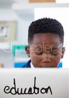 Education text against office kid boy using a computer background