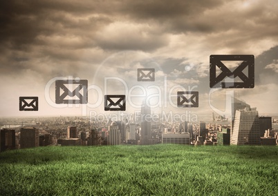Email icons over city