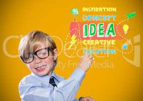 Boy writing in front of yellow blank background with concept idea graphics