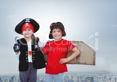 Kids in pirate and pilot costumes over city