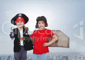 Kids in pirate and pilot costumes over city