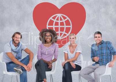 Group of people sitting in front of Heart with world globe charity