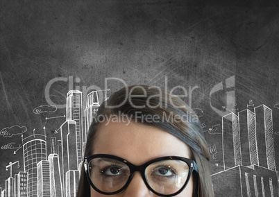 Business woman looking up against grey background with city icons