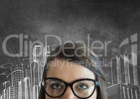 Business woman looking up against grey background with city icons