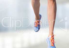 Athletic legs running with blurred background
