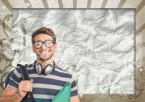 Happy young student man holding a folder against brown and white splattered background