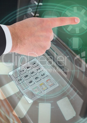 Hand touching bank ATM machine with interface graphics