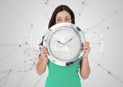 Woman holding clock in front of scientific connections