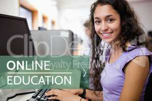 Online education text and woman using a computer
