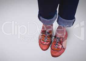 Dainty woman's feet and shoes with bright background